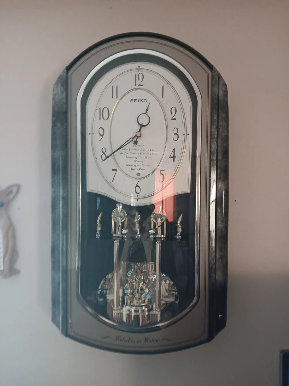 Seiko Silver-Tone Pendulum Wall Clock with White Dial